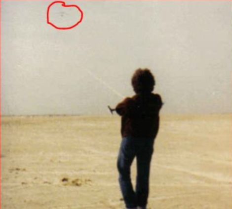 Bill Comings and wife having a great day Kiting.png