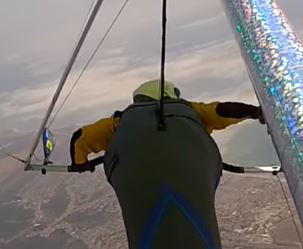 RightHandAdjustingRtDownTubeHeldCamera.JPG